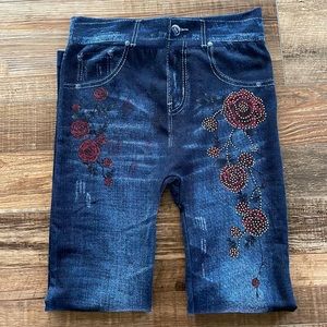 Red roses an bling jeggings.